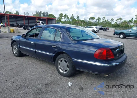 2001 Lincoln Continental из США, поврежденный, VIN 1LNHM97V41Y614240